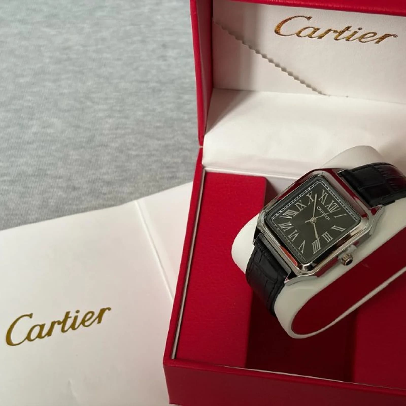 Santos de Cartier кожаные